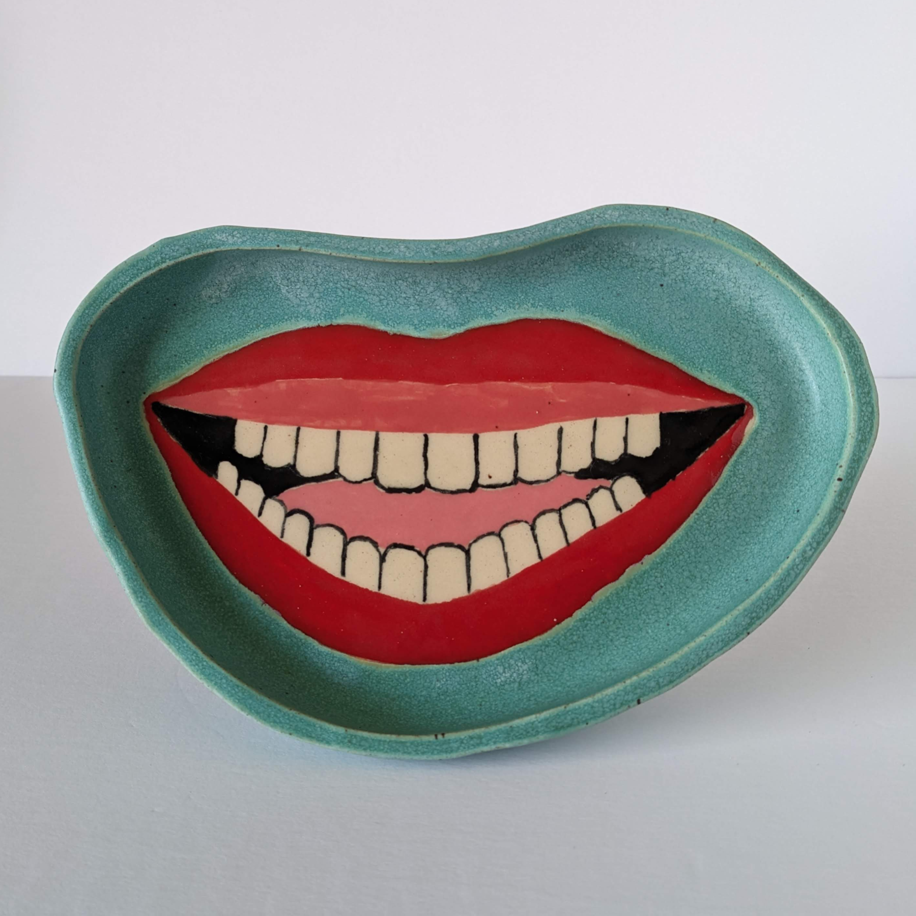 Ceramic smile plate